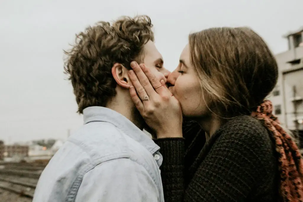 What does it mean when he bites your lip while kissing?