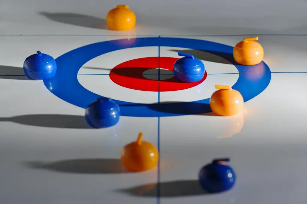 What are green lights on curling stones?