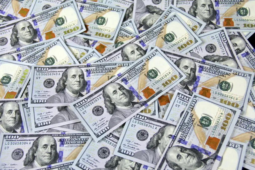 How do counterfeiters Bleach Money?