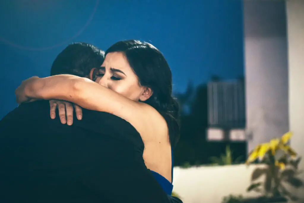 What does a Tight Hug mean from a Woman?